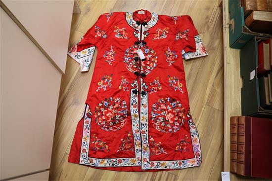 A Chinese embroidered silk and lacework gown